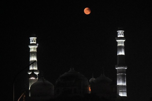 Full Moon seen in the sky above the old city of Lucknow, Tuesday, Nov. 8, 2022. India witnessed the year's last lunar eclipse on Tuesday evening. (Photo source: PTI)
