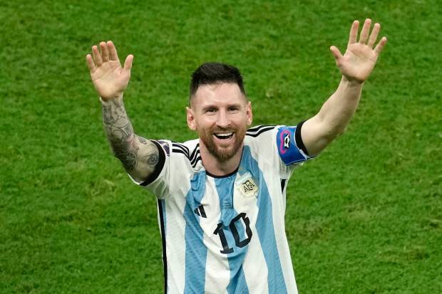 Argentina's Lionel Messi celebrates his side's victory at the end of the World Cup final soccer match between Argentina and France at the Lusail Stadium in Lusail, Qatar. (AP Photo)