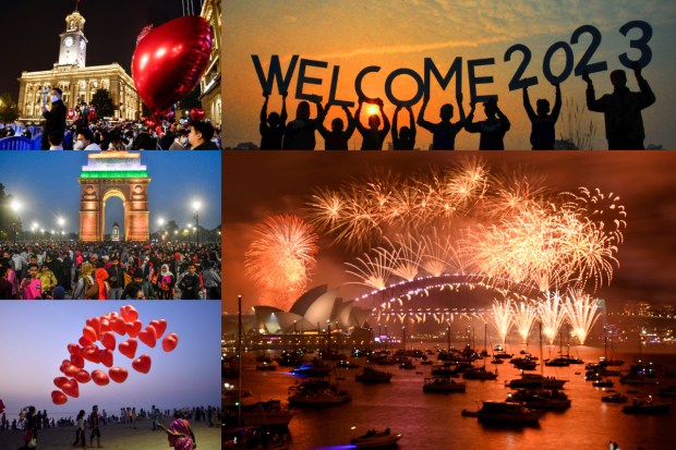 The world is ringing in 2023 with great gusto and grandeur. Mega celebrations returned to major cities around the globe. From spectacular fireworks in Sydney, Auckland, Tokyo to big gatherings in Delhi, Mumbai and Dubai, the world has put away the gloom of coronavirus pandemic to usher in 2023. In New York, the traditional December ritual of Times Square drew large audience to witness the 'ball drop'. In Paris and London, major landmarks are lit up in beautiful lights. Even in China's Wuhan, the epicenter of the first wave of coronavirus back in 2020, people were seen out on the streets. Despite fresh wave of Covid infections and some concerns over economic recession, nations are optimistic about what 2023 holds for them. Here are some pictures from around the world telling the tales of celebration. (Photos: PTI/AP/Reuters)