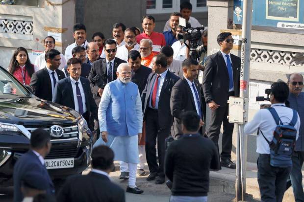 Ahmedabad: Prime Minister Narendra Modi arrives to cast his vote at a polling booth during the second and final phase of Gujarat Assembly elections, at Ranip area in Ahmedabad. (PTI Photo)