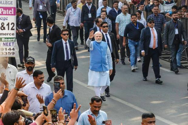 Ahmedabad: Prime Minister Narendra Modi arrives to cast his vote at a polling booth during the second and final phase of Gujarat Assembly elections, at Ranip area in Ahmedabad. (PTI Photo)