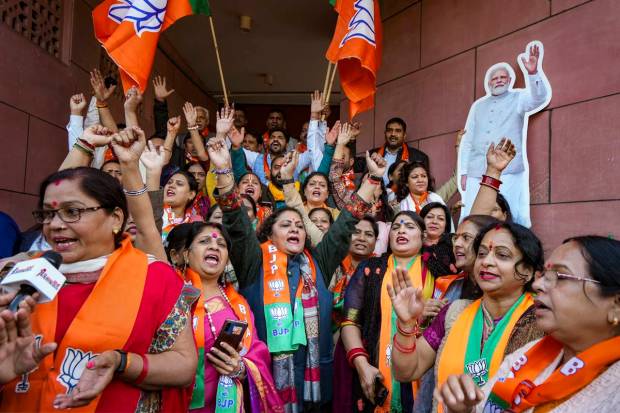 New Delhi: BJP workers celebrate the party's victory in Gujarat Assembly elections, at BJP Headquarters in New Delhi. (PTI Photo)