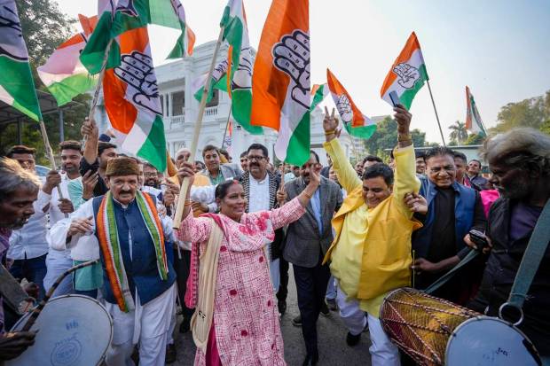 Lucknow: Congress workers celebrate the party's decisive lead in Himachal Pradesh Assembly Election, at the party office in Lucknow. (PTI Photo)