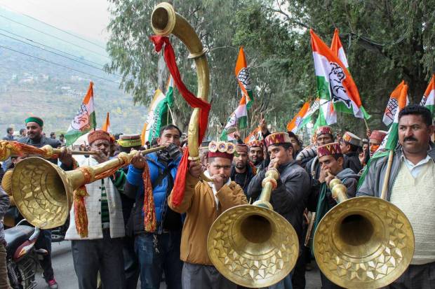 Kullu: Congress workers celebrates the party's victory in Himachal Pradesh Assembly elections, in Kullu. (PTI Photo)