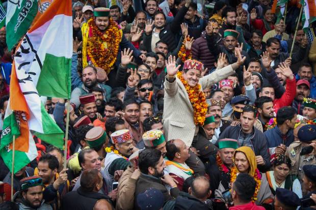 Kullu: Congress candidate Sunder Singh Thakur with supporters celebrates his win in the Himachal Pradesh Assembly elections, in Kullu. (PTI Photo)
