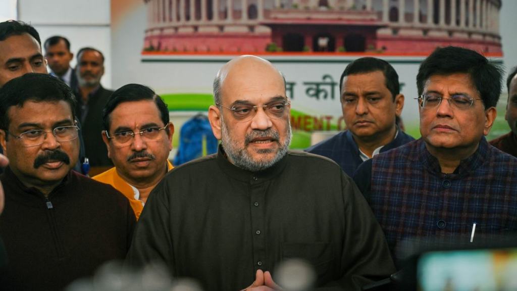 Union Home Minister Amit Shah speaks with the media after paying tribute to martyrs who lost their lives in the 2001 Parliament attack on its 21st anniversary, at Parliament House complex in New Delhi, Tuesday, Dec. 13, 2022. Union Ministers Pralhad Joshi, Dharmendra Pradhan and Piyush Goyal are also seen. (PTI Photo)
