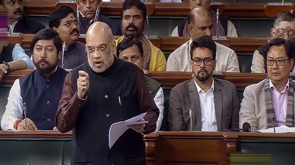 Home Minister Amit Shah speaks in the Lok Sabha during the Winter Session of Parliament, in New Delhi, Wednesday, Dec. 21, 2022. (PTI Photo)
