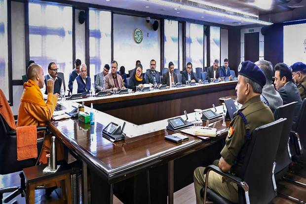 Uttar Pradesh Chief Minister Yogi Adityanath speaks during a meeting with Team-9 officials on the COVID-19 situation in the state. (PTI Photo)