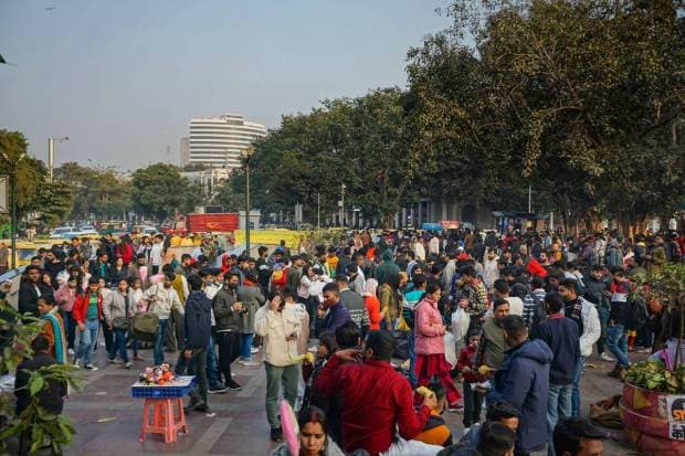 New Delhi: People throng Connaught Place on Christmas, in New Delhi. (PTI Photo)