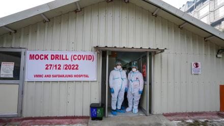 Health workers during a mock drill for COVID-19 preparedness, at Safdarjung hospital in New Delhi, Tuesday, Dec. 27, 2022. (PTI Photo)

