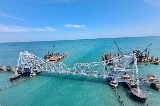 The Indian Railways' new Pamban Bridge in the state of Tamil Nadu is state-of-the-art technology and a vital part of the country's infrastructure development. It is also India'first vertical lift railway sea bridge. This dual-track bridge is 84 per cent complete with the track laying work going on. The 72m long vertical lift span is the talking point of this iconic bridge. It will allow the lifting of the span (by 17m) for large ships to pass below the bridge (Image: @AshwiniVaishnaw/Twitter)