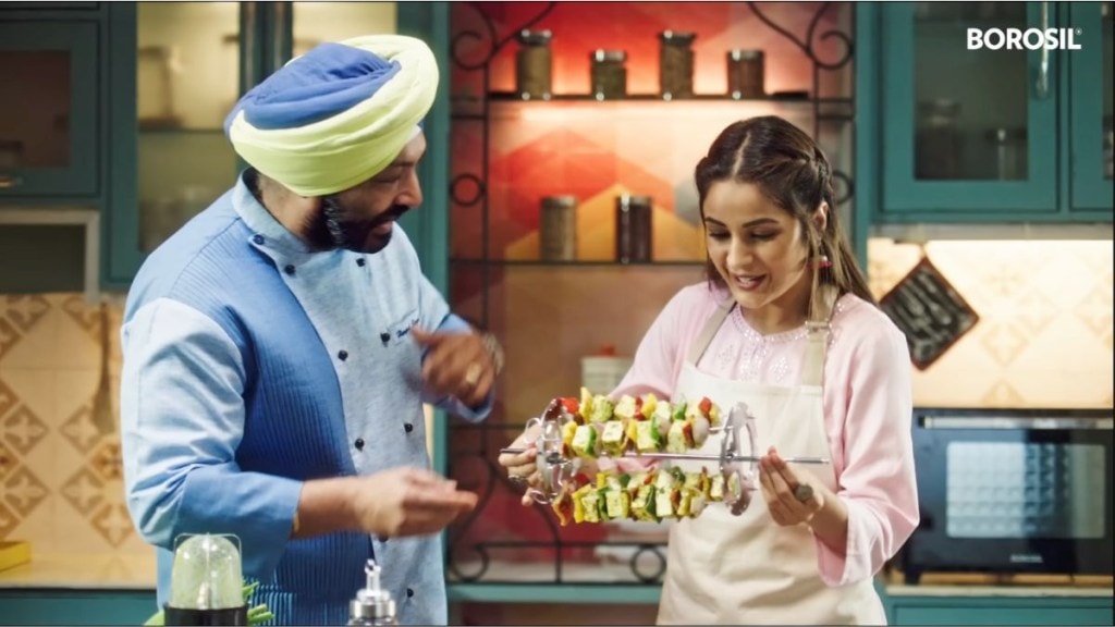 The campaign film shows Shehnaaz Gill and Harpal Singh Sokhi making the 'Shahenaazi Paneer Tikka' The campaign film shows Shehnaaz Gill and Harpal Singh Sokhi making the 'Shahenaazi Paneer Tikka'