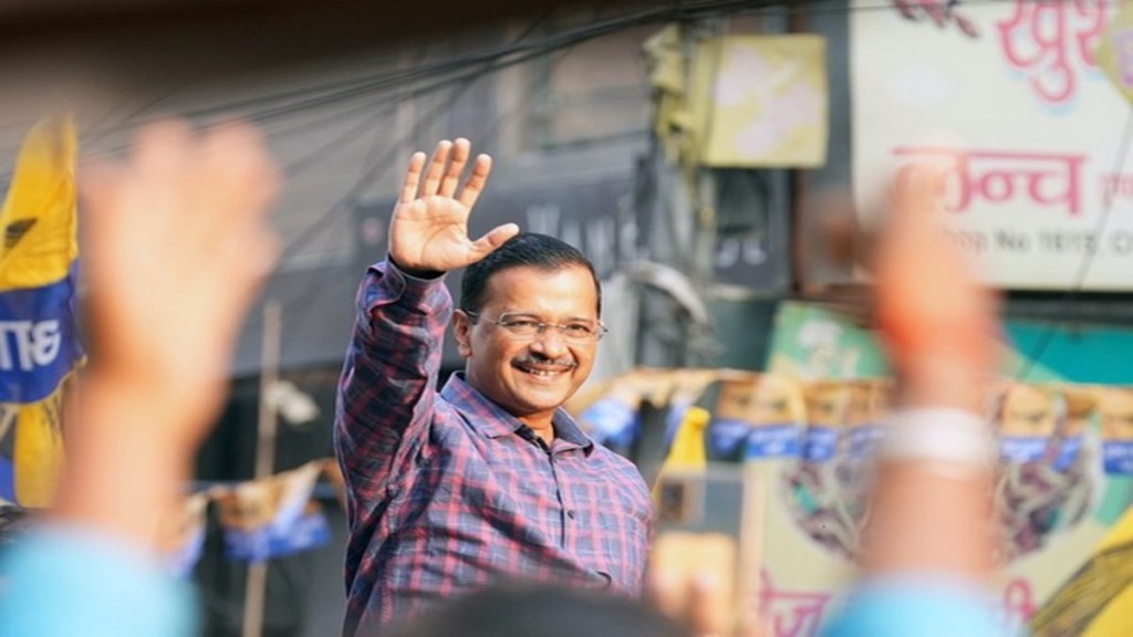 Delhi Chief Minister Arvind Kejriwal waves to supporters as AAP crosses majority mark in MCD election results (ANI)