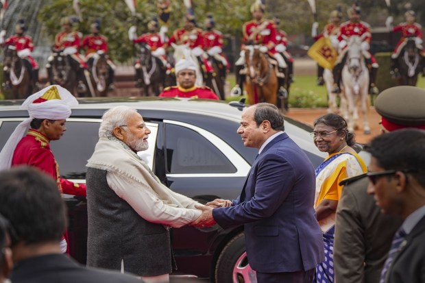 Egyptian President Abdel Fattah El-Sisi shakes hands with Prime Minister Narendra Modi as he leaves after his ceremonial reception at the Rashtrapati Bhavan. (PTI photo)