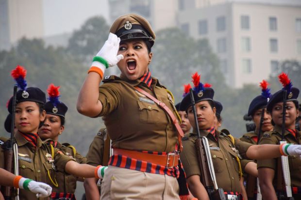 Security force personnel march past during the 74th Republic Day function in Agartala on Thursday. (Image: PTI)