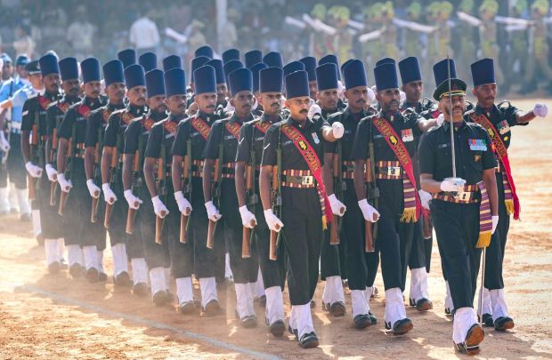 Madras Engineering Group (MEG) personnel march during the 74th Republic Day Parade at Manek Shaw Parade ground in Bengaluru on Thursday. (Image: PTI)
