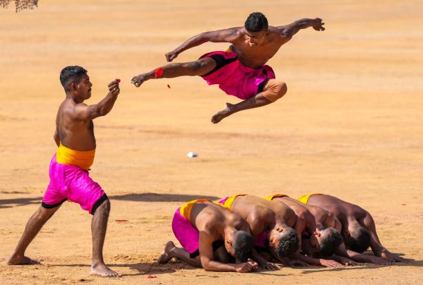 Madras Engineering Group (MEG) personnel perform 'Kalaripayattu', a martial art and dance form, during the 74th Republic Day Parade at Manek Shaw Parade function in Bengaluru on Thursday. (Image: PTI)