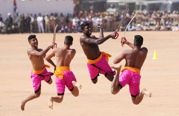 Madras Engineering Group (MEG) personnel perform 'Kalaripayattu', a martial art and dance form, during the 74th Republic Day Parade at Manek Shaw Parade function in Bengaluru on Thursday. (Image: PTI)
