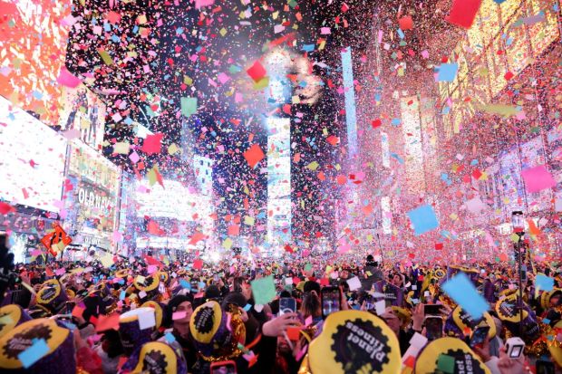 Confetti flies around the countdown clock during the first public New Year's event since the coronavirus disease (COVID-19) pandemic, at Times Square, in the Manhattan borough of New York City. (Image/Reuters)