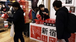 Uniqlo, wage hike, employees, inflation, retailer, new hires, fast-fashion apparel, annual salaries, productivity, consumer prices, monetary easing