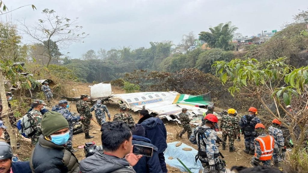Rescue teams work to retrieve bodies from the wreckage of the crash of a Yeti Airlines operated aircraft, in Pokhara, Nepal January 16, 2023. REUTERS/Krishna Mani Baral.
