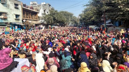 Residents of Banbhoolpura in Haldwani stage a dharna ahead of the Supreme Court order on the plea opposing their imminent eviction, in Haldwani, Thursday, Jan. 5, 2022. (PTI Photo)