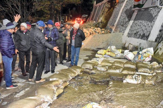 Team of senior officials and experts led by Garhwal Commissioner Sushil Kumar during its visit to assess the cracks appearing in houses in Joshimath, Thursday, Jan. 5, 2023. (PTI Photo)