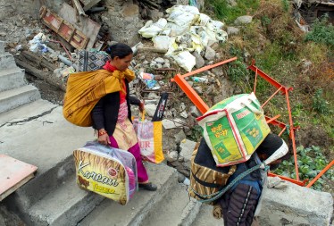 People shift their belongings from buildings affected by the land subsidence, in Joshimath, Thursday, Jan. 12, 2023. (PTI Photo)