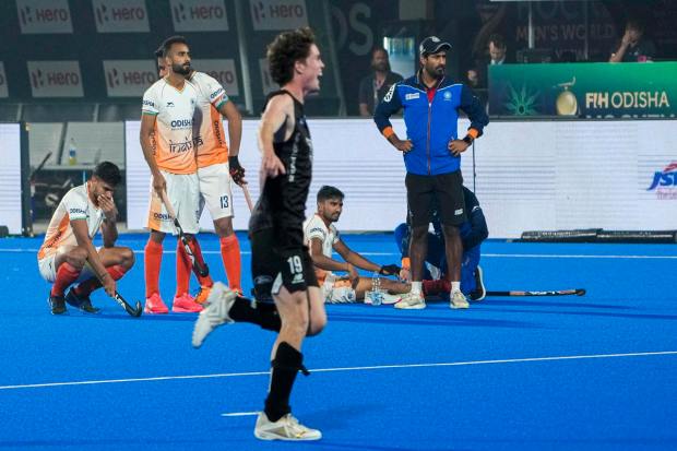 Bhubaneswar: A New Zealand player celebrates the win against India as Indian players react after losing the match in the 2023 Men's FIH Hockey World Cup, in Bhubaneswar, Sunday, Jan. 22, 2023. (PTI Photo/Gurinder Osan)\