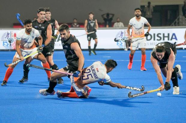 Bhubaneswar: India's Raj Kumar Pal is fouled by New Zealand's Kane Russell in the penalty area during a match between India and New Zealand, in the 2023 Men's FIH Hockey World Cup, in Bhubaneswar, Sunday, Jan. 22, 2023. (PTI Photo/Gurinder Osan)