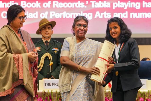 New Delhi: President Droupadi Murmu with Union Minister Smriti Irani confers Pradhan Mantri Rashtriya Bal Puraskar to Shreya Bhattacharjee, in New Delhi, Monday, Jan 23, 2023. (PTI Photo/Atul Yadav) 