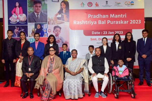 New Delhi: President Droupadi Murmu with Union Minister Smriti Irani in a group photo at the Pradhan Mantri Rashtriya Bal Puraskar, 2023, ceremony, in New Delhi, Monday, Jan. 23, 2023. (PTI Photo) 