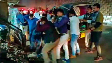 People near the convoy of Janata Dal-United (JDU) leader Upendra Kushwaha who alleged in a tweet that his convoy was attacked near Nayka Tola's turn in Jagdishpur of Bihar's Bhojpur district, Monday, Jan. 30, 2023. (PTI Photo)
