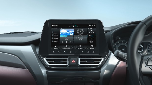 It features a 9-inch vertical infotainment system compatible with wireless Apple CarPlay and Android Auto. Additionally, it also gets a 360-degree camera 6 speaker Arkamy’s music system, a wireless phone charger, paddle shifters and Head-up display.
