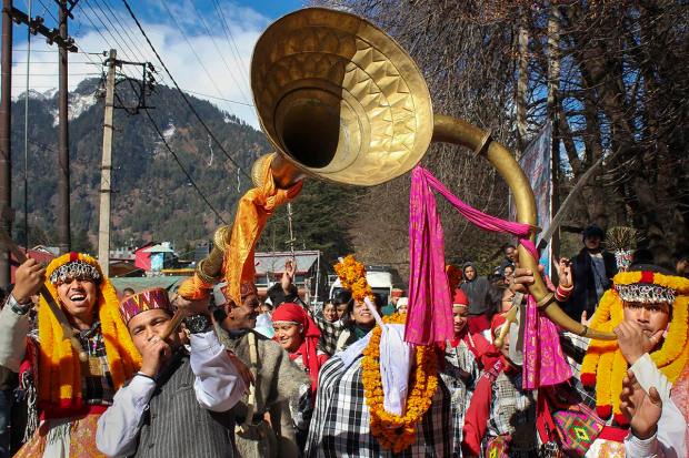 Manali: Artists play instruments during the Manali Winter Carnival 2023, in Manali, Monday, Jan. 2, 2023. (PTI Photo)