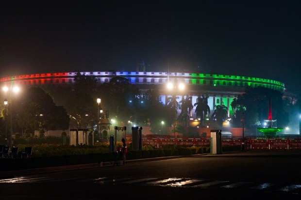 Sansad Bhawan in the colours of the national flag marking the 74th Republic Day. (PTI photo)