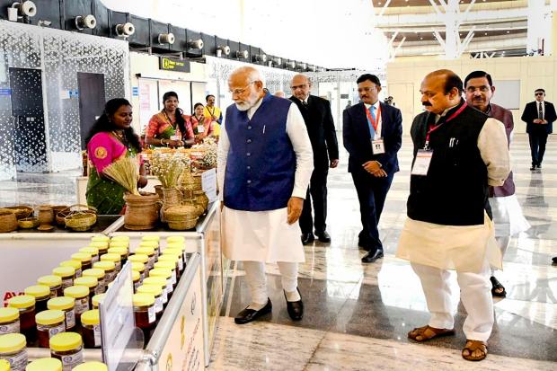 Shivamogga: Prime Minister Narendra Modi with Union Minister Pralhad Joshi, Karnataka Chief Minister Basavaraj Bommai and others during the inauguration of the Shivamogga Airport, Monday, Feb. 27, 2023. (PTI Photo)