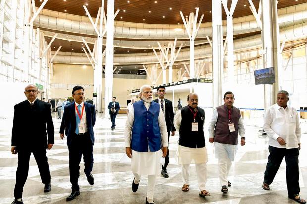 Prime Minister Narendra Modi with Union Minister Pralhad Joshi, Karnataka Chief Minister Basavaraj Bommai and others during the inauguration of the Shivamogga Airport, Monday, Feb. 27, 2023. (PTI Photo)(PTI02_27_2023_000165B)
