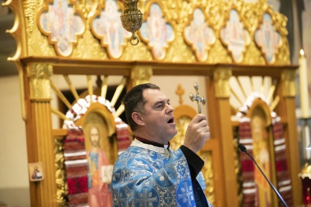 Rev. Myron Myronyuk holds a special community prayer service at St. Vladimir Ukrainian Greek Catholic Church in Scranton. (AP Photo)