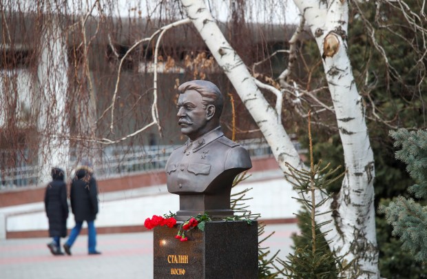 Red carnations are placed under the bronze bust of Soviet leader Josef Stalin, which was recently unveiled to mark the 80th anniversary of the Red Army's defeat of Nazi Germany's troops in the Battle of Stalingrad. (Reuters photo)