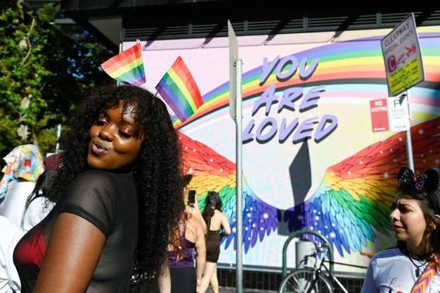 A woman reacts during the annual Sydney Gay and Lesbian Mardi Gras Parade in conjunction with Sydney WorldPride 2023 in Sydney, Australia. REUTERS