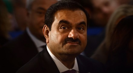 Adani Group, Gautam Adani, PTC India Ltd, preserve cash, bidders, stock price, coal plant project, Hindenburg Research, revenue growth, capital expenditure
