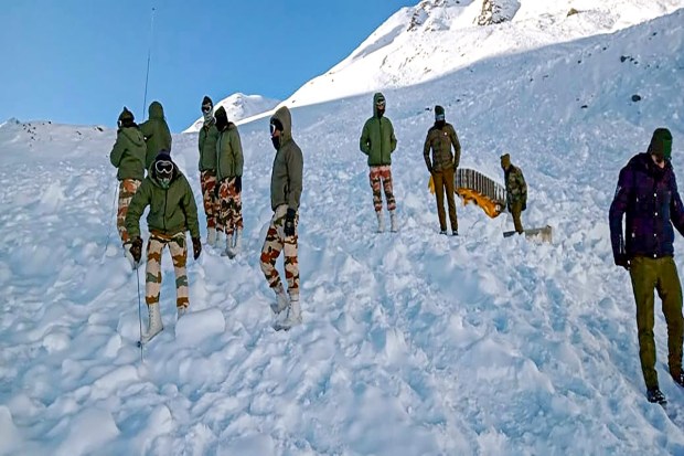 Border Roads Organisation and District Disaster Management Authority personnel carry out a search operation at a snow avalanche hit area near Chika on Darcha-Shinkula road in Lahaul and Spiti on Wednesday. (Image: PTI photo)