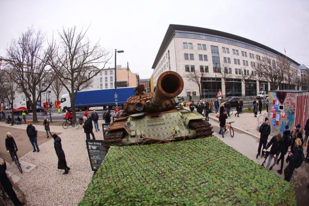 The remains of a destroyed Russian T-72 tank, secured from the Ukrainian village of Dmytrivka, outside Kyiv are on display near the Russian embassy at Unter den Linden boulevard. (Reuters photo)