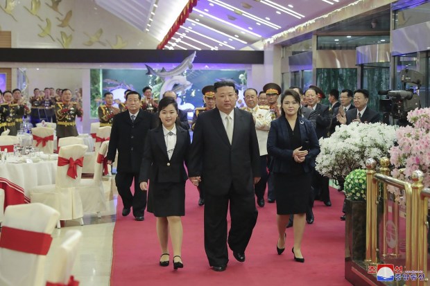 North Korean leader Kim Jong Un lauded the “irresistible might” of his nuclear-armed military as he visited troops with his wife and daughter to mark the 75th founding anniversary of his army. (AP Photo)