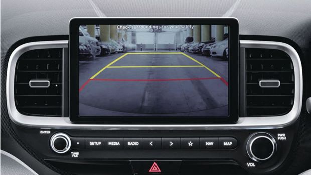Other safety features include a reverse camera with guide lines, VSM, auto headlamps, cornering lamps, hill assist control, ESC, and more.