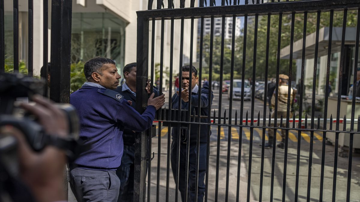 Private security guards close the gate of a building housing BBC office in New Delhi, India, Tuesday, Feb. 14, 2023. (AP Photo/Altaf Qadri)
Private security guards close the gate of a building housing BBC office in New Delhi, India, Tuesday, Feb. 14, 2023. (AP Photo/Altaf Qadri)