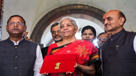 Union Finance Minister Nirmala Sitharaman with Ministers of State Bhagwat Kishanrao Karad and Pankaj Chaudhary and officials poses for photographs on her arrival at Parliament for the presentation of the Union Budget 2023-24, in New Delhi, Wednesday, Feb. 1, 2023. (PTI Photo/Kamal Singh)
