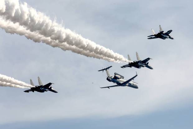 Bengaluru: Indian Air Force's EMB-145, Su-30 and MIG-29 aircrafts fly past in 'Netra' formation during the full dress rehearsal of Aero India 2023, at Yelahanka air base in Bengaluru. (PTI Photo)
