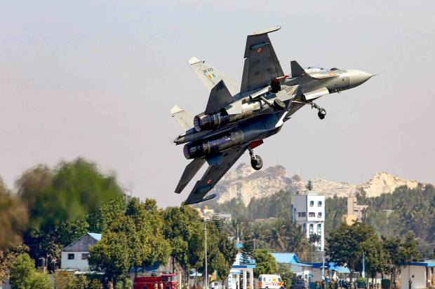 Bengaluru: Indian Air Force's Su-30 aircraft flies past during the full dress rehearsal of Aero India 2023, at Yelahanka air base in Bengaluru. (PTI Photo)